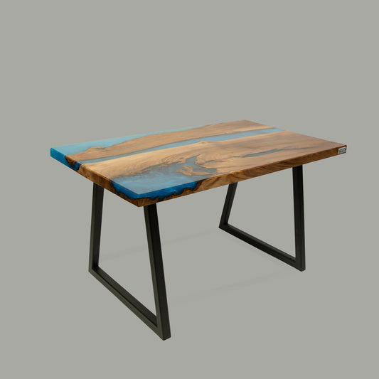 Coffee table made from wood and epoxy resin in the color classic blue