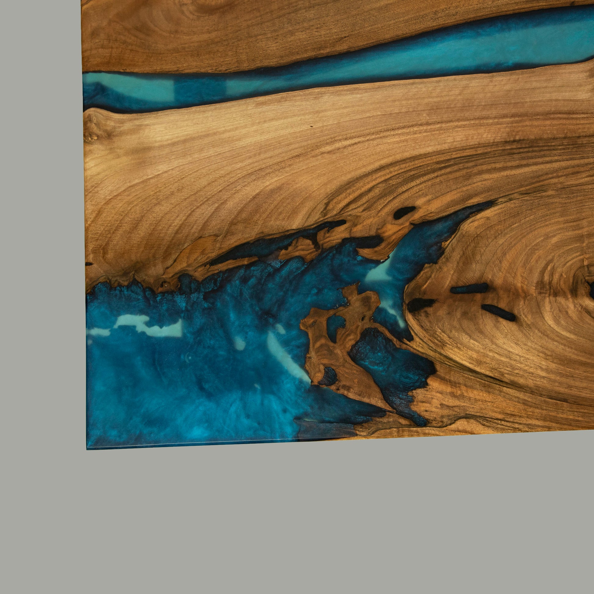 Coffee table made from wood and epoxy resin in the color classic blue