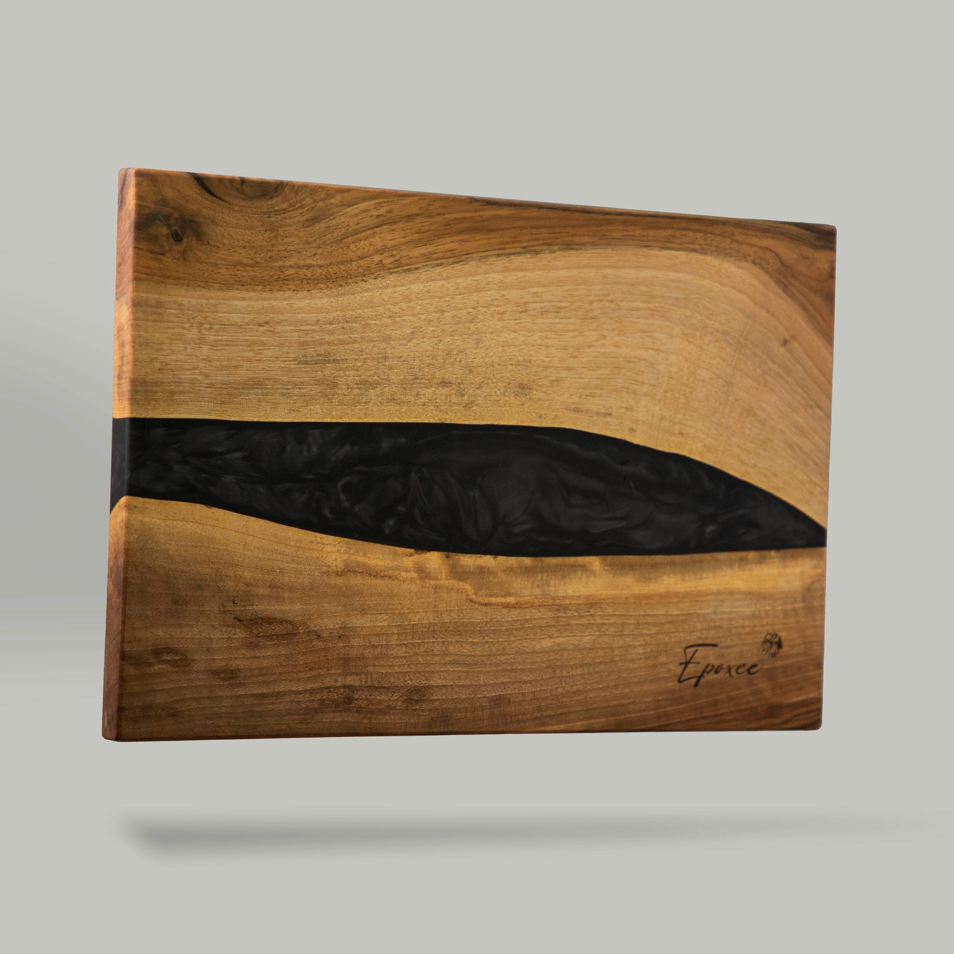 Serving board made from wood and epoxy resin in the color gun powder