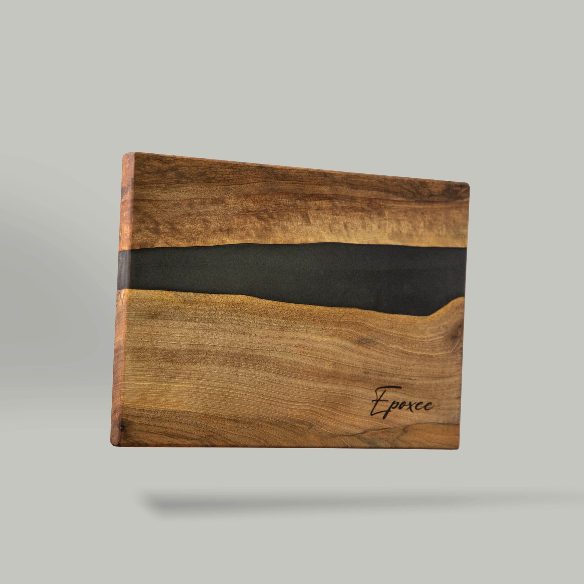 Serving board made from wood and epoxy resin in the color gun powder