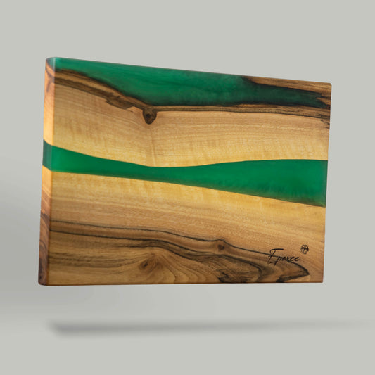 Serving board made from wood and epoxy resin in the color emerald green